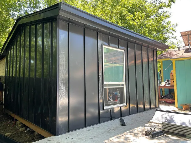 Black standing seam metal wall panels for Roof Inspection in View Park-Windsor Hills