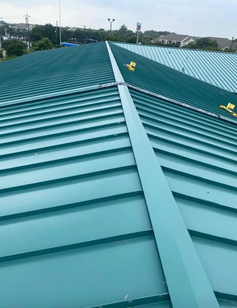 Green commercial metal roof ridge and valley for Metal Roof Repair in View Park-Windsor Hills